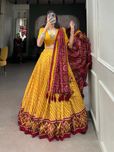 Yellow Tussar Silk Lehenga Choli with Leheriya Print, Patola Border & Bandhani Dupatta